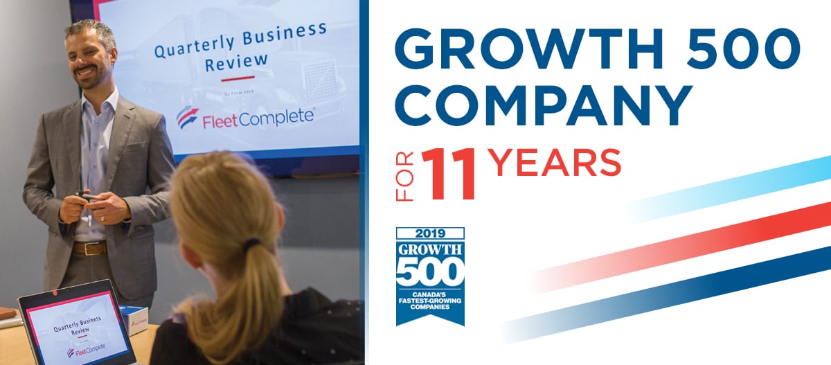 CEO at board meeting and growth 500 banner